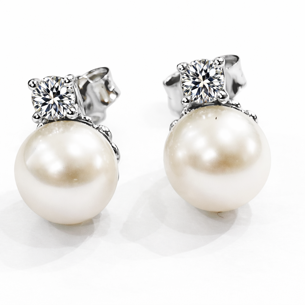 Orecchini perla con Diamanti ct 0,16 in oro bianco 18kt (750)