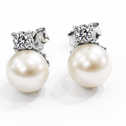 Orecchini perla con Diamanti ct 0,16 in oro bianco 18kt (750)