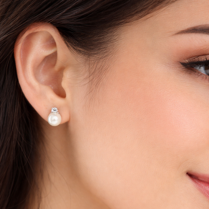 Orecchini perla con Diamanti ct 0,16 in oro bianco 18kt (750)