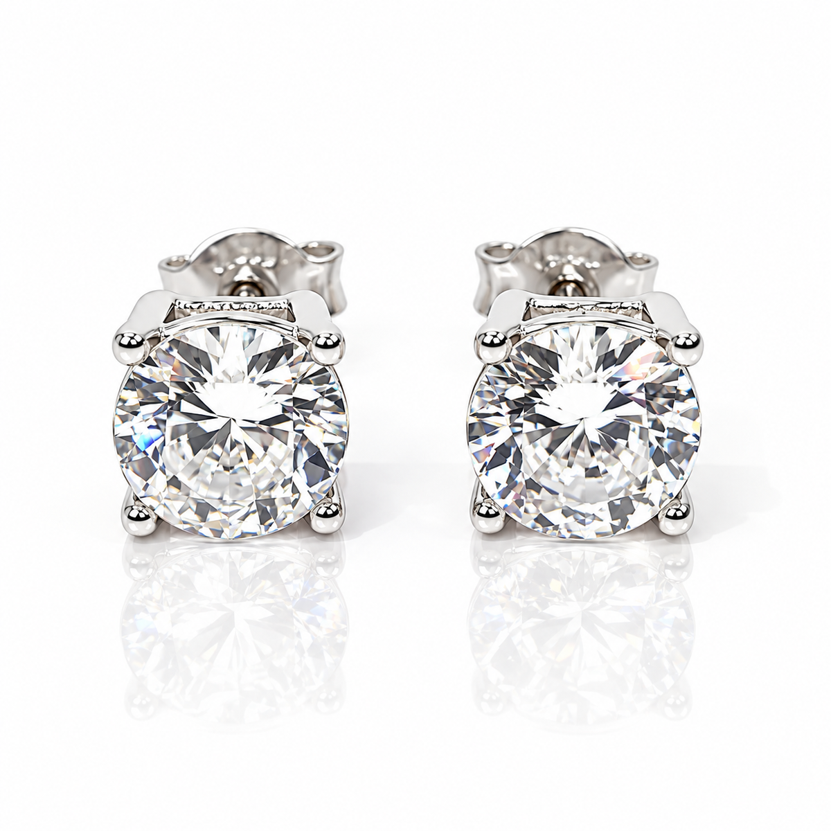 Orecchini punto luce a filo con diamanti ct 0,20 ct in oro bianco 18Kt (750)