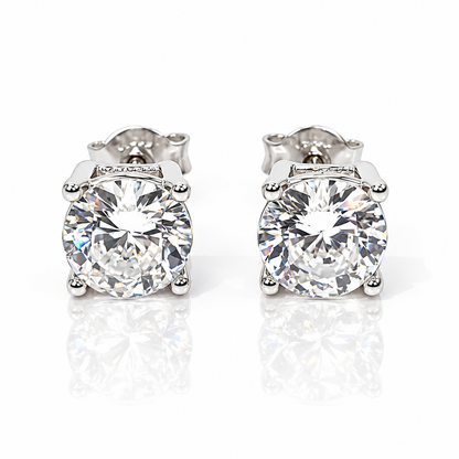 Orecchini punto luce a filo con diamanti ct 0,20 ct in oro bianco 18Kt (750)