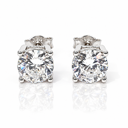 Orecchini punto luce a filo con diamanti ct 0,40 ct in oro bianco 18Kt (750)