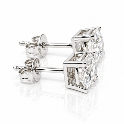 Orecchini punto luce a filo con diamanti ct 0,20 ct in oro bianco 18Kt (750)