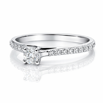 Anello solitario con diamante centrale ct 0,15 e diamanti laterali ct 0,15 in oro bianco 18kt (750) certificato HRD Antwerp