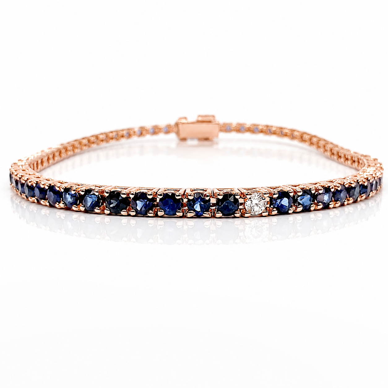 Bracciale Tennis con diamanti ct 0,27 e zaffiri blu ct 4,54 in oro rosa 18kt (750)