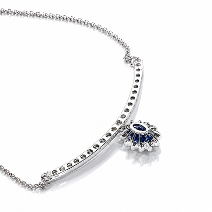 Collana "sorriso" pendente con zaffiro blu ct 0,66 e diamanti ct 0,52 in oro bianco 18kt (750)