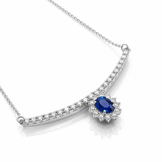 Collana "sorriso" pendente con zaffiro blu ct 0,66 e diamanti ct 0,52 in oro bianco 18kt (750)