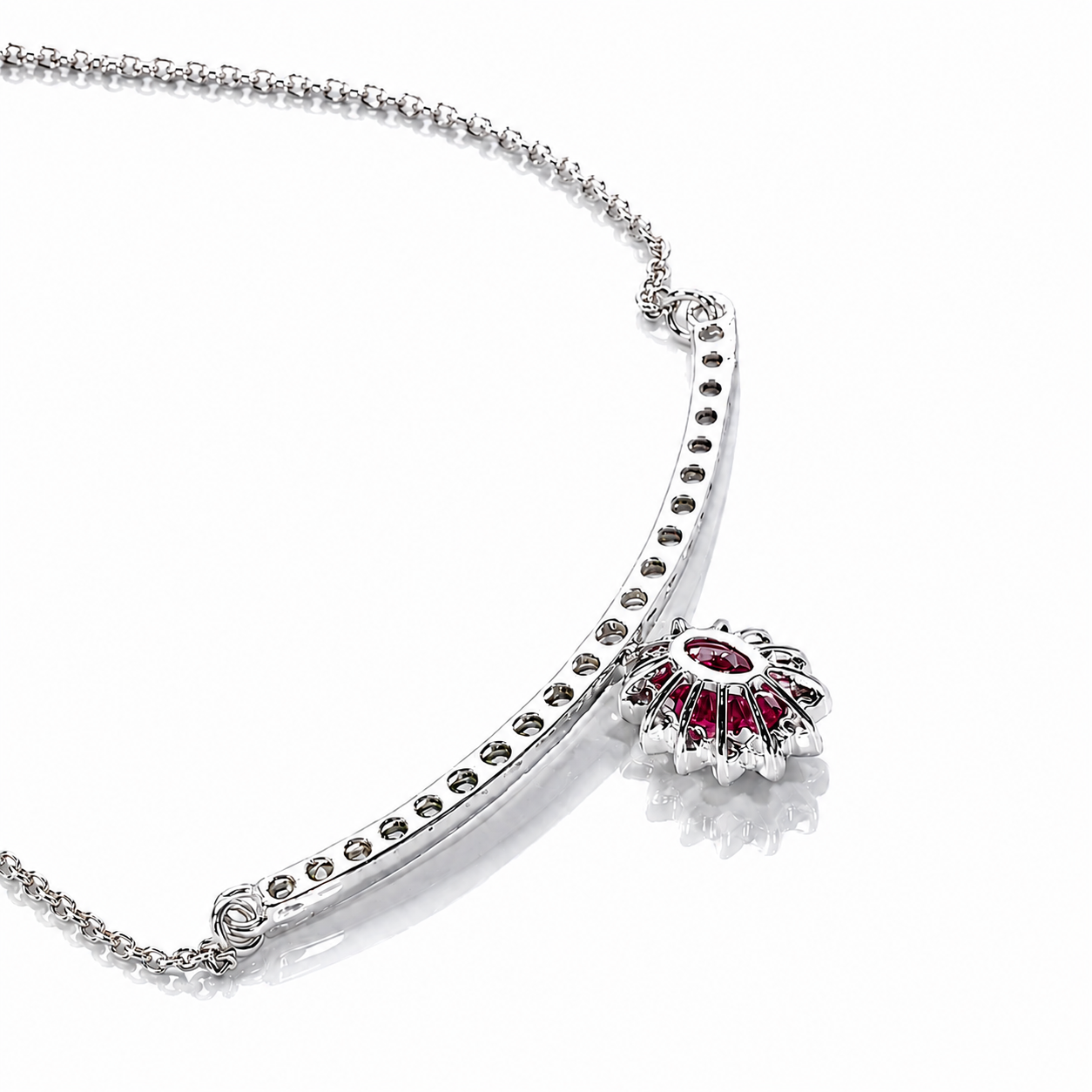 Collana "sorriso" pendente con rubino ct 0,57 e diamanti ct 0,52 in oro bianco 18kt (750)