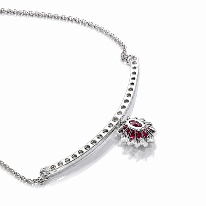 Collana "sorriso" pendente con rubino ct 0,57 e diamanti ct 0,52 in oro bianco 18kt (750)