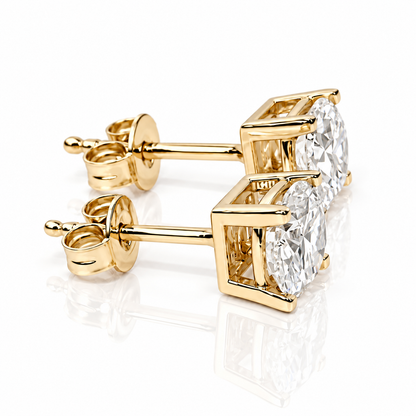 Orecchini punto luce a filo con diamanti ct 0,10 in oro giallo 18Kt (750)