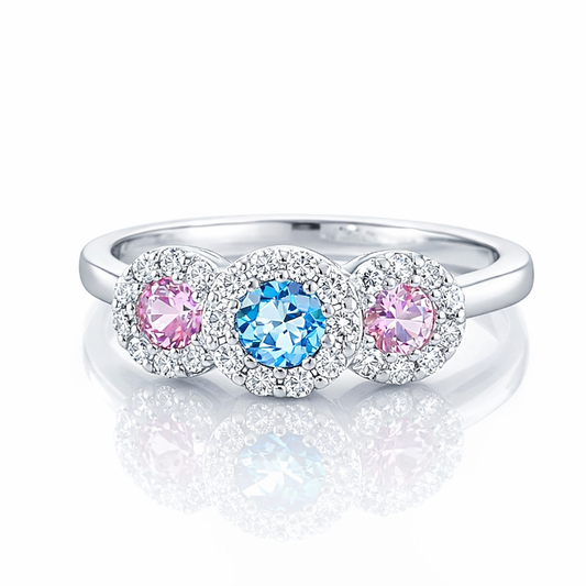 Anello trilogy zaffiro rosa ct 0,23 acquamarina ct 0,12 e diamanti bianchi ct. 0,28 oro bianco 18kt (750)