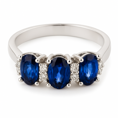 Anello trilogy in oro bianco 18kt con zaffiri ovali ct 0,89 e Diamanti ct 0,09