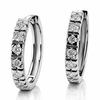 Orecchini a cerchio con diamanti 0,56 ct in oro bianco 18kt (750)