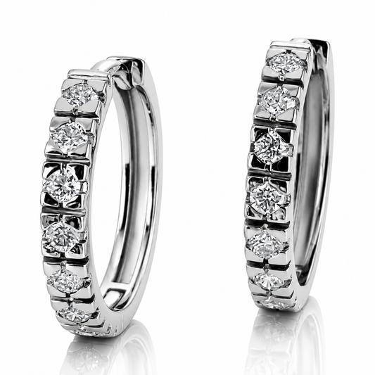 Orecchini a cerchio con diamanti 0,56 ct in oro bianco 18kt (750)