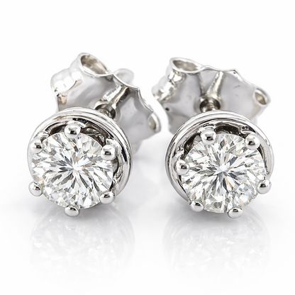 Orecchini punto luce Tiffany con Diamanti 0,50 ct in oro bianco 18Kt (750)