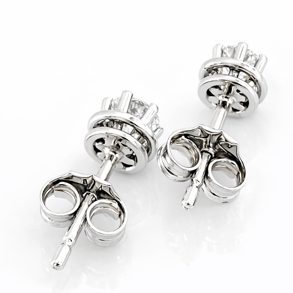 Orecchini punto luce Tiffany con Diamanti 0,50 ct in oro bianco 18Kt (750)