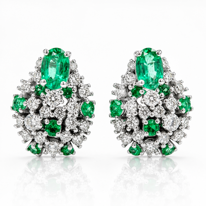 Orecchini Astralia e diamanti ct 0,98 e smeraldi ct 1,51 in oro bianco 18kt (750)