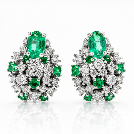Orecchini Astralia e diamanti ct 0,98 e smeraldi ct 1,51 in oro bianco 18kt (750)