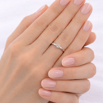 Anello solitario Tiffany 6 griffe con diamante ct 0,10 in oro bianco 18Kt (750)