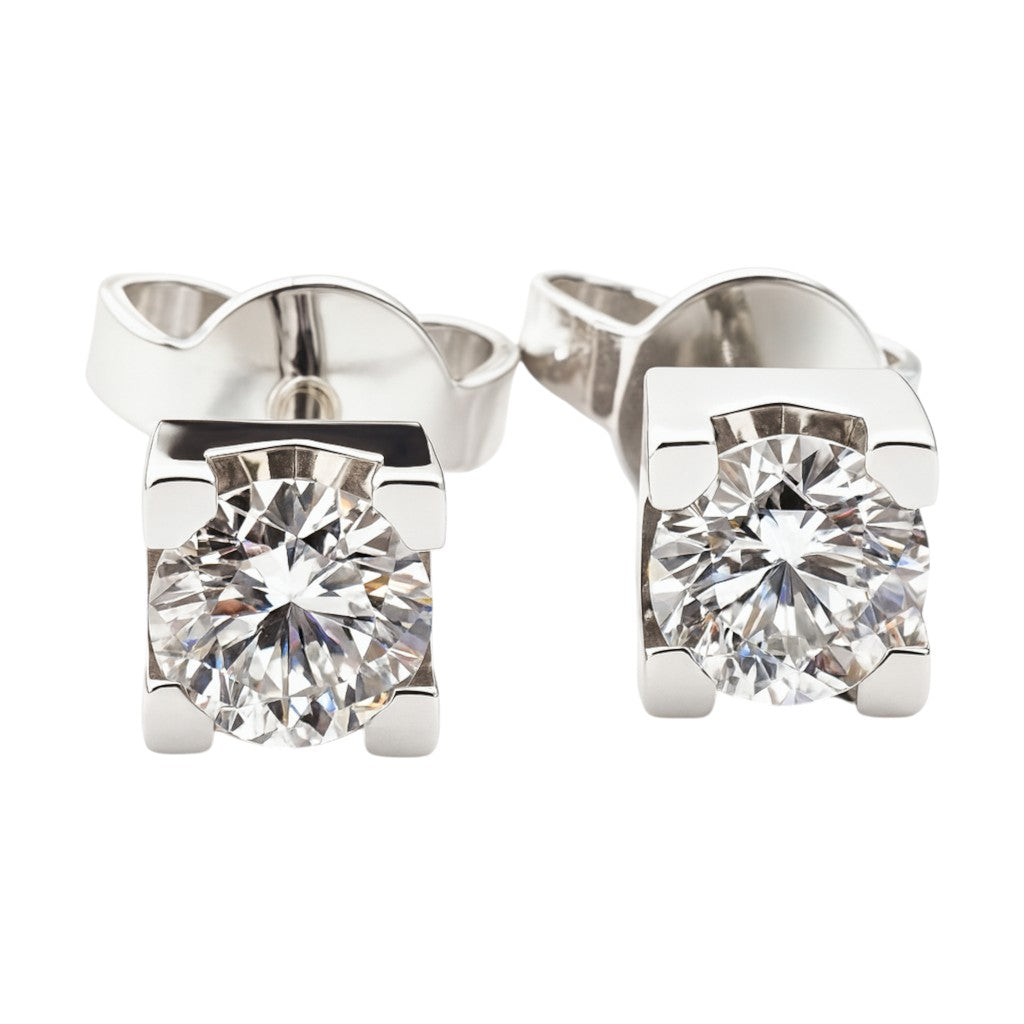 Orecchini punto luce con diamanti 0,70 ct in oro bianco 18kt (750)