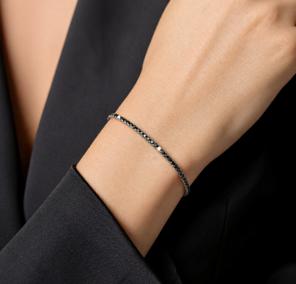 Bracciale Tennis diamanti neri ct 2,02 diamanti bianchi ct 0,15 in oro bianco e brunito 18kt (750)