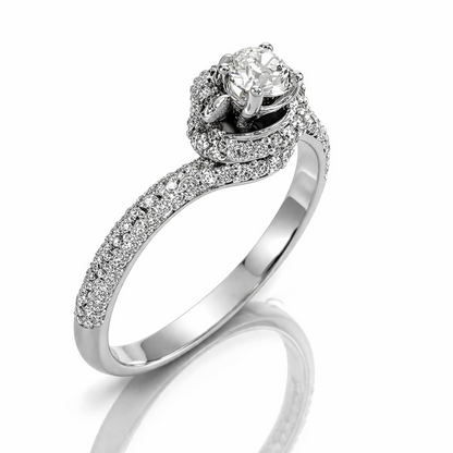 Anello solitario con diamante centrale 0,20 ct + contorno 0,50 ct in oro bianco 18kt (750)