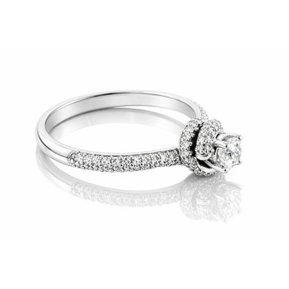 Anello solitario con diamante centrale 0,20 ct + contorno 0,50 ct in oro bianco 18kt (750)