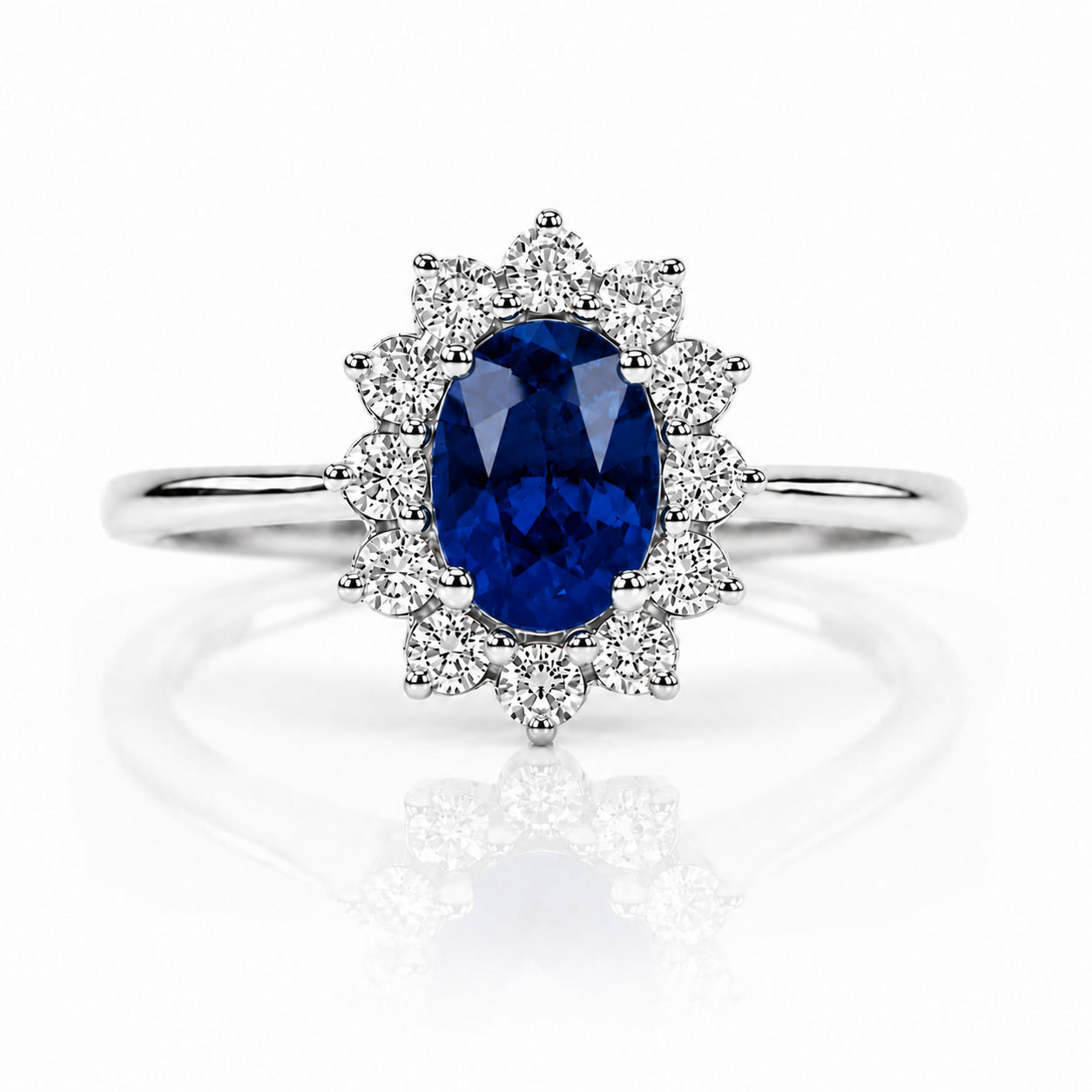 Anello con zaffiro blu ovale ct 0,55 e diamanti ct 0,20 in oro bianco 18kt (750)