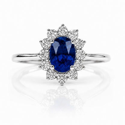 Anello con zaffiro blu ovale ct 0,55 e diamanti ct 0,20 in oro bianco 18kt (750)