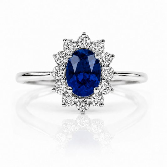 Anello con zaffiro blu ovale ct 0,55 e diamanti ct 0,20 in oro bianco 18kt (750)