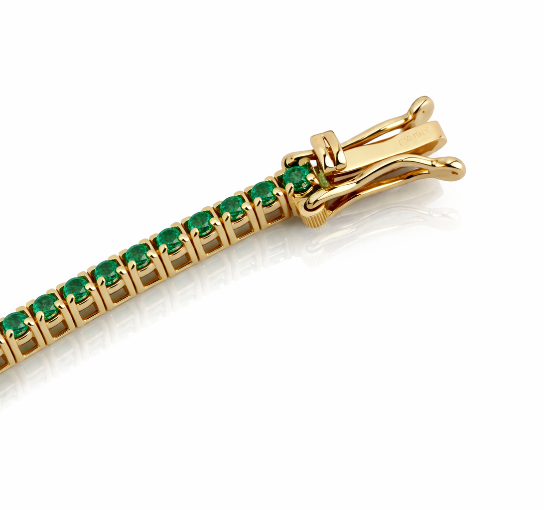Bracciale Tennis con smeraldo 7,80 ct e diamanti 0,89 ct in oro giallo 18kt (750) – 21 cm