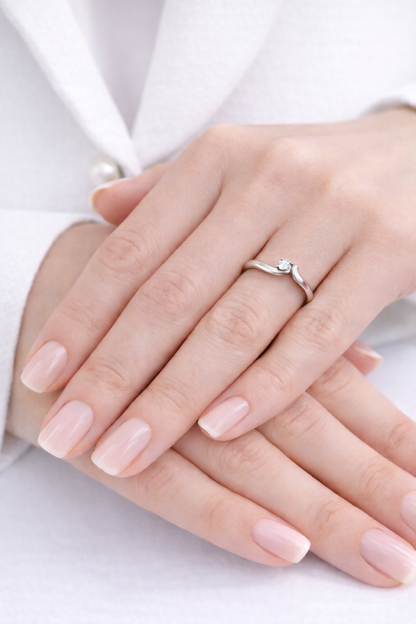 Anello solitario Valentino con Diamante ct 0,10  in oro bianco 18kt (750)