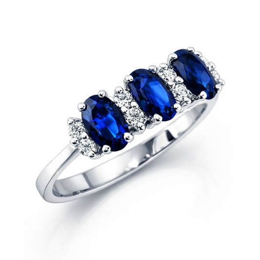 Anello trilogy con zaffiri ovali ct 0,89 e Diamanti ct 0,09 in oro bianco 18kt (750)