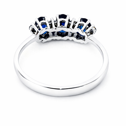 Anello trilogy con zaffiri ovali ct 0,89 e Diamanti ct 0,09 in oro bianco 18kt (750)