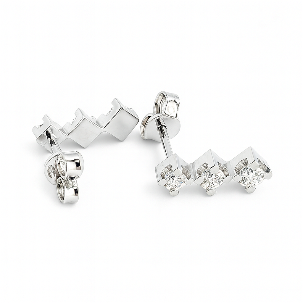 Orecchini Trilogy con diamanti 0,45 ct in oro bianco 18Kt (750)
