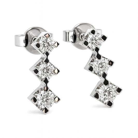 Orecchini Trilogy in oro bianco 18Kt con diamanti 0,45 ct