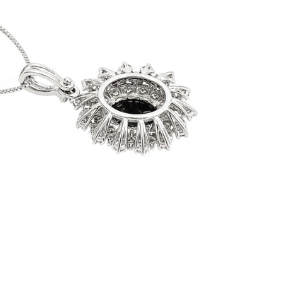 Collana pendente con zaffiro ovale ct 0,97 e diamanti ct 0,45 in oro bianco 18kt (750)