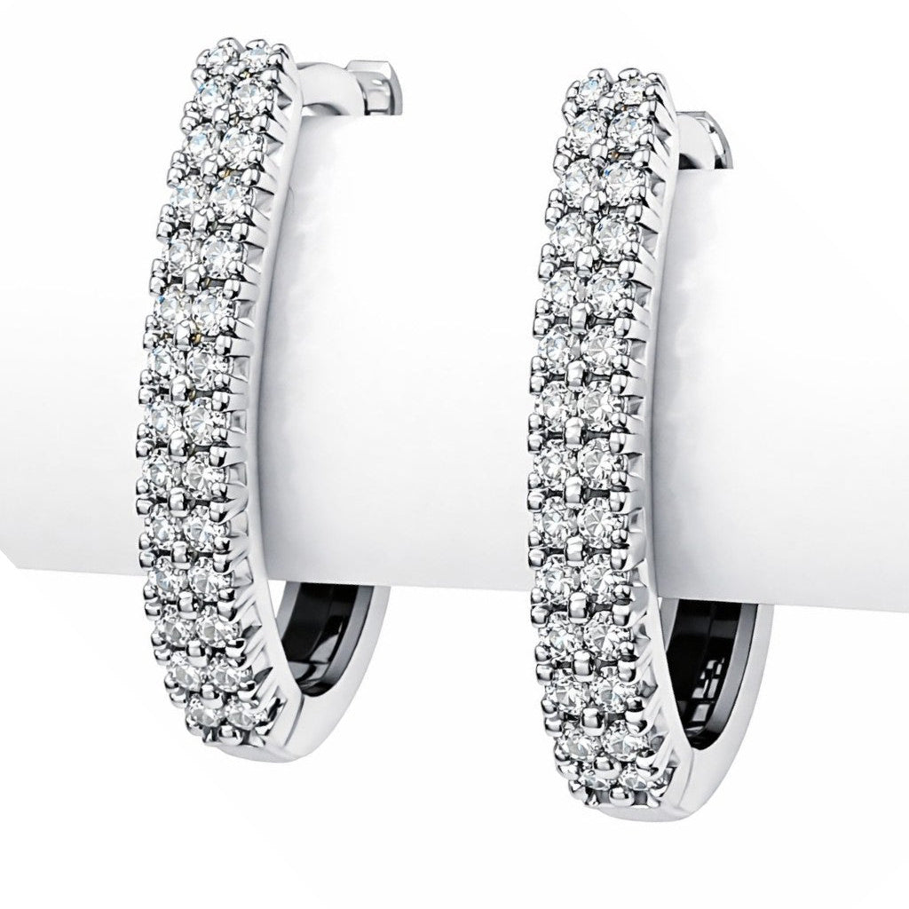 Orecchini ovali in pavé con diamanti bianchi ct 0,31 in oro bianco 18kt (750)