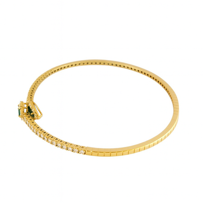 Bracciale a molla contrarié “Astralia” in oro giallo 18Kt con smeraldi 0,77 ct e diamanti 0,92 ct