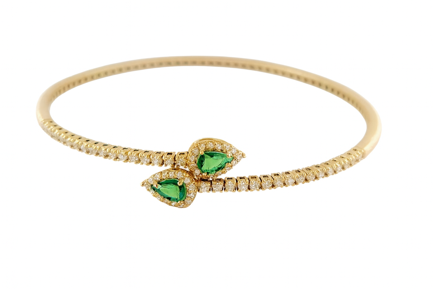 Bracciale a molla contrarié “Astralia” in oro giallo 18Kt con smeraldi 0,77 ct e diamanti 0,92 ct