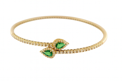 Bracciale a molla contrarié “Astralia” in oro giallo 18Kt con smeraldi 0,77 ct e diamanti 0,92 ct