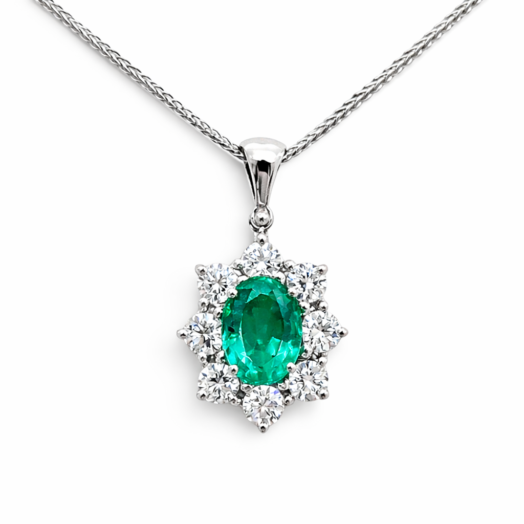 Collana con pendente smeraldo ovale ct 0.94 e Diamanti ct 0.67 in oro bianco 18kt (750)