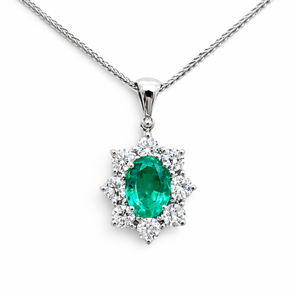 Collana con pendente smeraldo ovale ct 0.94 e Diamanti ct 0.67 in oro bianco 18kt (750)