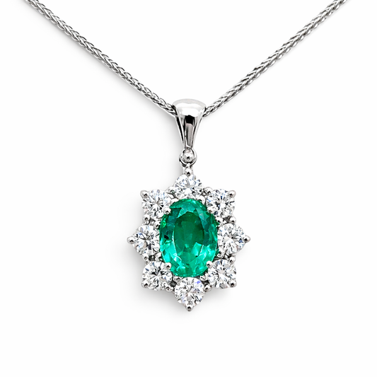 Collana con pendente smeraldo ovale ct 0.94 e Diamanti ct 0.67 in oro bianco 18kt (750)