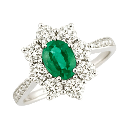 Anello in oro bianco 18kt con Smeraldo Ovale ct 0,58 e contorno di Diamanti ct 0,66