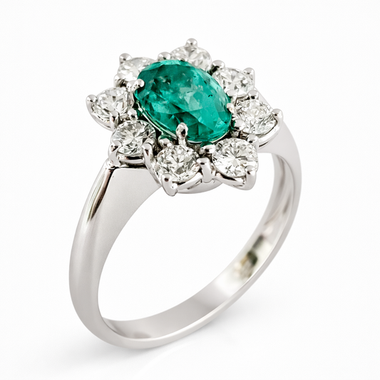 Anello con Smeraldo Ovale ct 0,73 e Diamanti ct 0,67 in oro bianco 18kt (750)