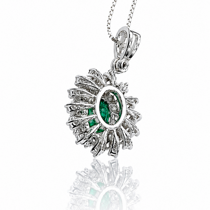 Collana con pendente smeraldo ovale ct 0,45 e diamanti ct 0,30 in oro bianco 18kt (750)