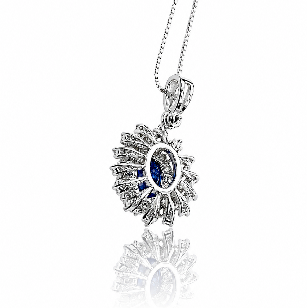 Collana con pendente zaffiro ovale ct 0,73 e diamanti ct 0,28 in oro bianco 18kt (750)