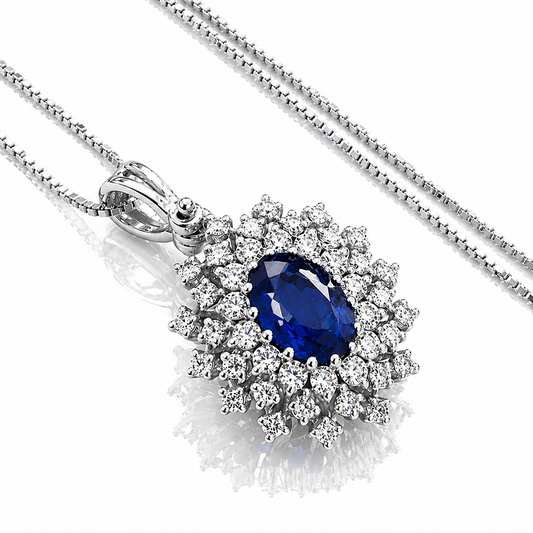 Collana con pendente zaffiro ovale ct 0,73 e diamanti ct 0,28 in oro bianco 18kt (750)