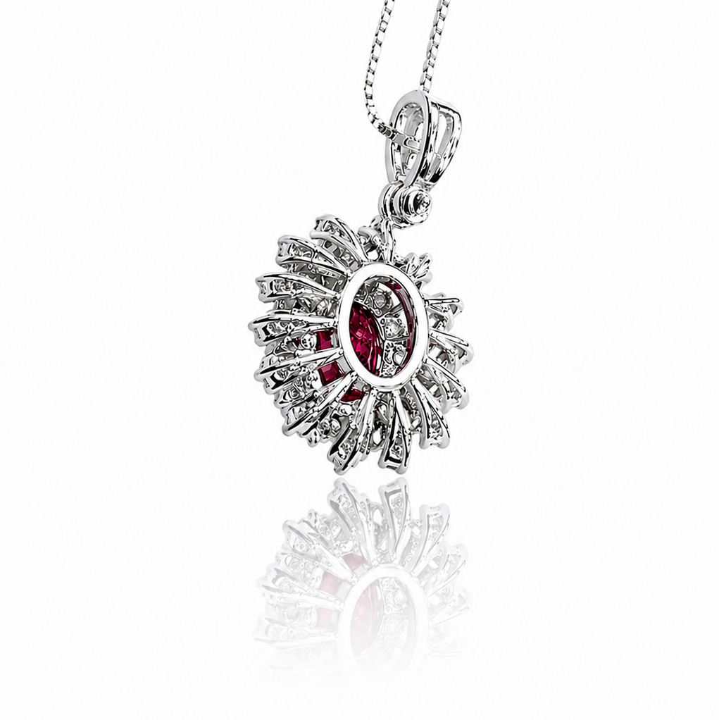 Collana con pendente rubino ovale ct 0,75 e diamanti ct 0,27 in oro bianco 18kt (750)